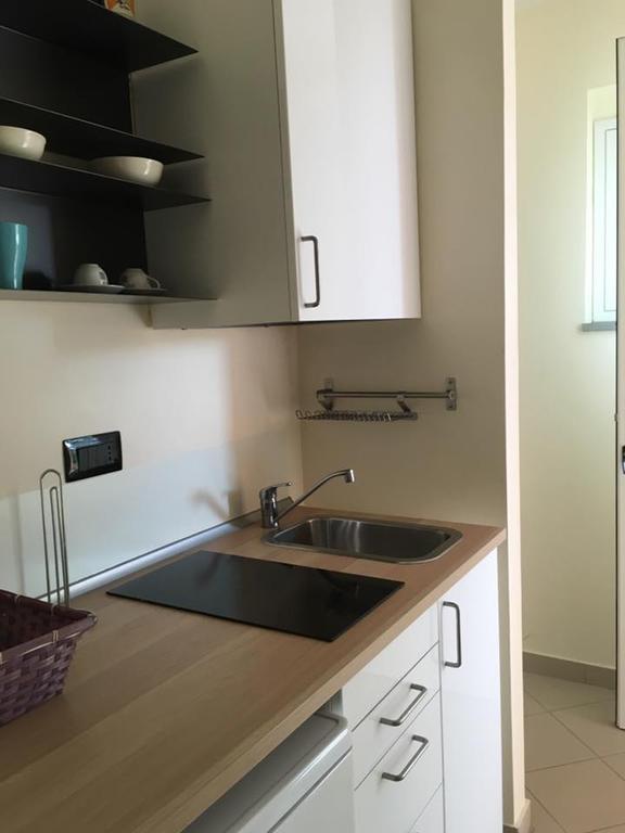 Baia Dei Delfini Aparthotel ฟูร์นารี ภายนอก รูปภาพ